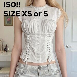 ISO Moda International in either white/cream or black!